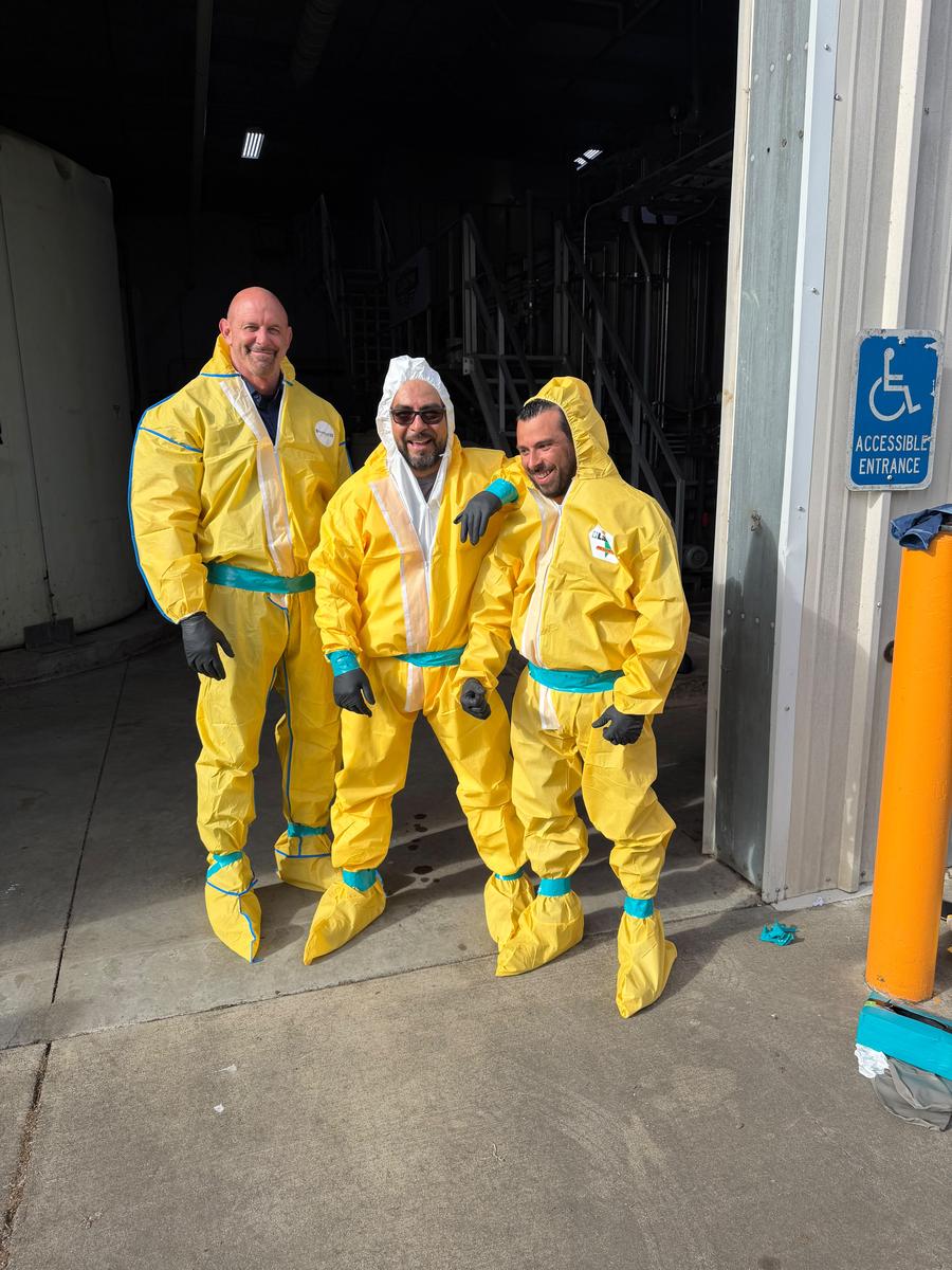 Allied technicians in full protective equipment
