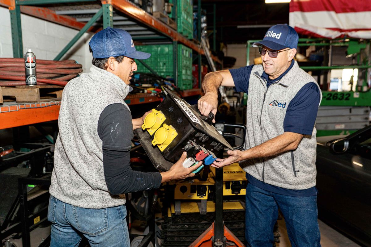 Allied Restoration technicians preparing emergency restoration equipment